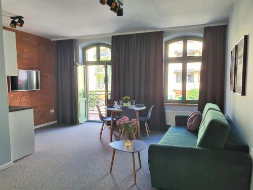 Svetainės erdvė apgyvendinimo įstaigoje Apartamenty K17