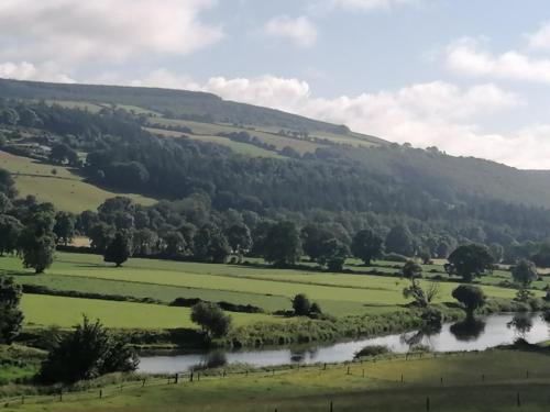 a view of a valley with a river at Cable Island Bed and Breakfast in Cork