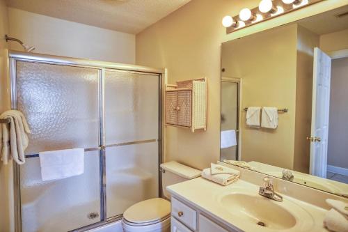 a bathroom with a shower and a sink at Brunswick Plantation Golf Resort 1509M in Calabash