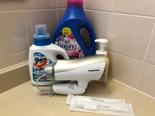 a blow dryer and a bottle of toothpaste at New Open!!! BRIDGE 小浜島 in Kohama