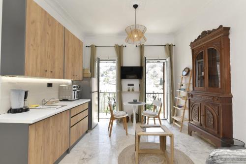 Η κουζίνα ή μικρή κουζίνα στο Centrale Apartment Symi