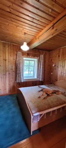 Postel nebo postele na pokoji v ubytování Sodyba Dubinga