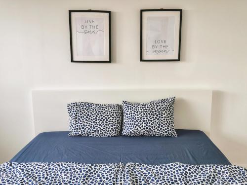 Кровать или кровати в номере Szín-Aranyhíd Apartman