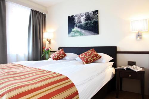 Postel nebo postele na pokoji v ubytování CITY STAY - Kieselgasse