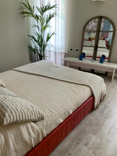 Ένα ή περισσότερα κρεβάτια σε δωμάτιο στο Inaqua