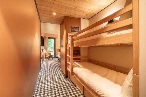 Postel nebo postele na pokoji v ubytování Mercure Peyragudes Loudenvielle Pyrénées