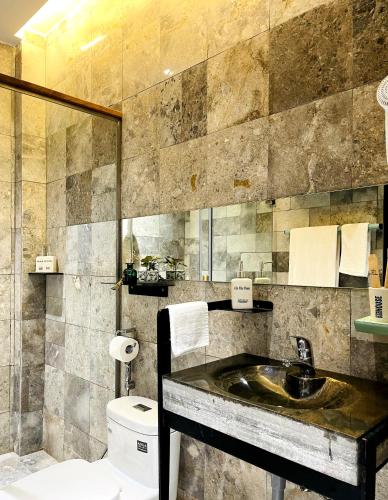 Un baño de Côn Đảo House
