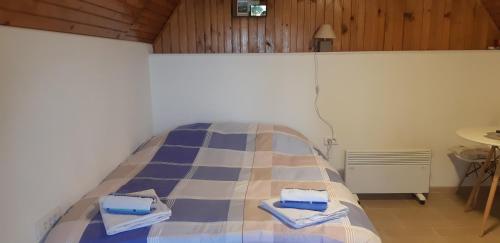 Ein Bett oder Betten in einem Zimmer der Unterkunft Durmitorski konak
