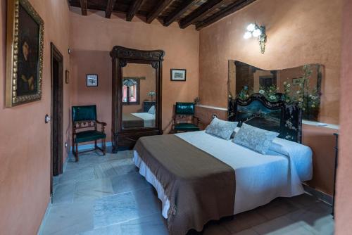 เตียงในห้องที่ Casa Palacio el Caballero de Malta