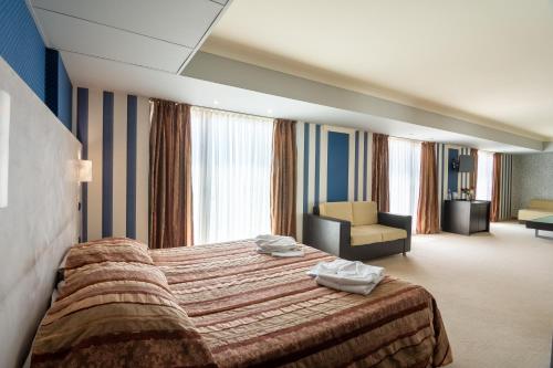 Katil atau katil-katil dalam bilik di Hotel Mistral