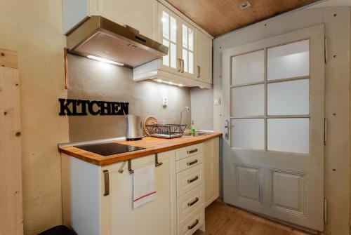 Кухня или мини-кухня в Boutique apartments
