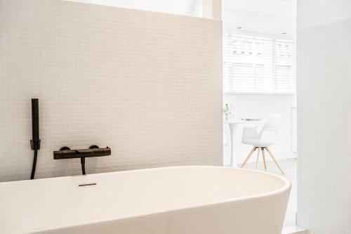 Ένα μπάνιο στο Bossche Suites No2 - Verwersstraat