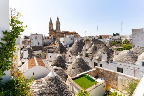 an aerial view of a city with roofs at Palazzo Scotto in Alberobello
