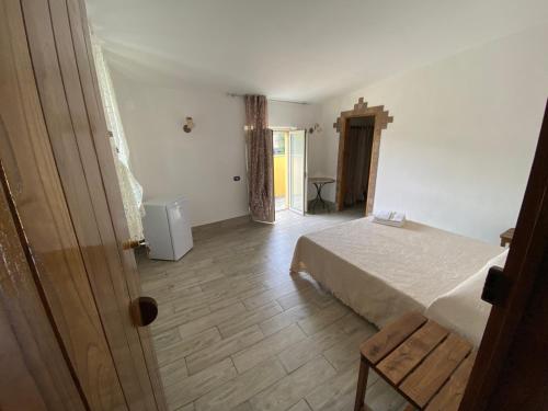 Postel nebo postele na pokoji v ubytování La Casa di Michele