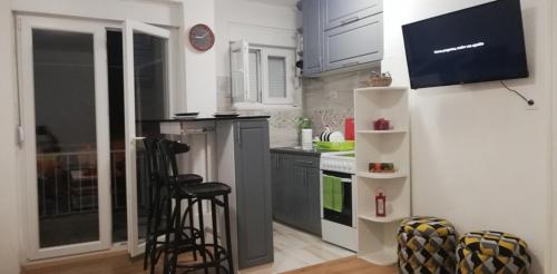 Kuchyň nebo kuchyňský kout v ubytování Teo Apartment