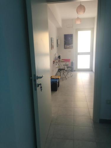 TV a/nebo společenská místnost v ubytování Casa di Ale