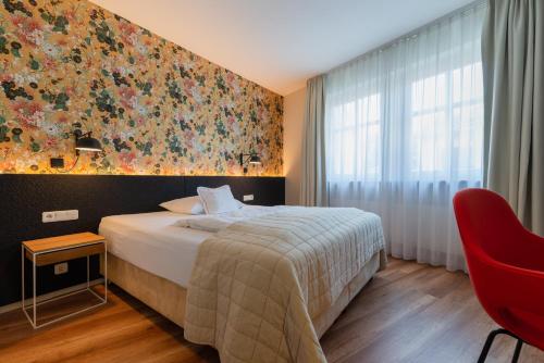 Hotel am Torturmにあるベッド