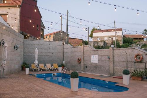 Πισίνα στο ή κοντά στο Hotel O Castro