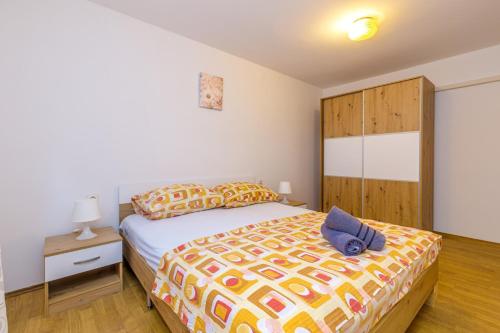 Postel nebo postele na pokoji v ubytování Apartments Slavko