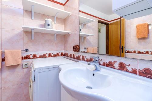 Koupelna v ubytování Apartments Slavko