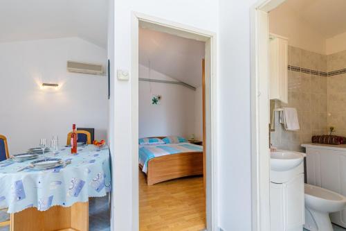 Koupelna v ubytování Apartments Slavko