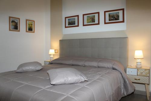 Postel nebo postele na pokoji v ubytování B&B 80056 Ercolano