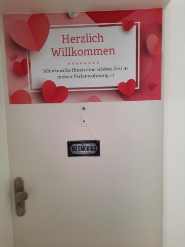 Un certificado, premio, letrero u otro documento en Ferienwohnung "Zum Haidmann"