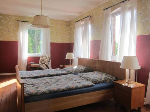 Postel nebo postele na pokoji v ubytování Ferienhaus Zum alten Standesamt