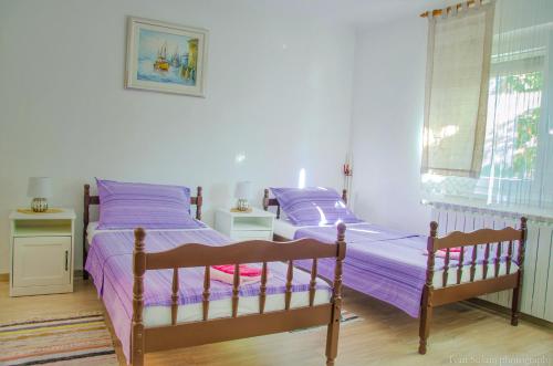 Postel nebo postele na pokoji v ubytování Apartment Rašće
