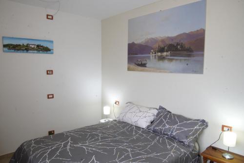 Posteľ alebo postele v izbe v ubytovaní La Casa delle Camelie