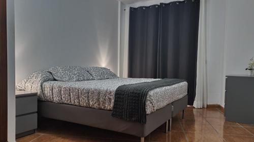 En eller flere senge i et værelse på Aguamarina 605