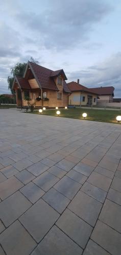 a driveway in front of a house with lights at Villa Mila 