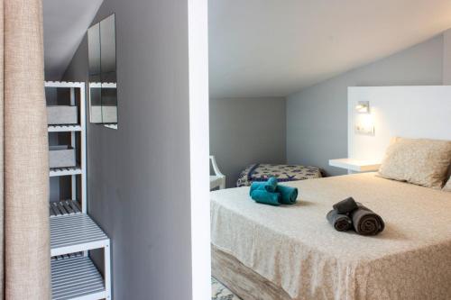 Ένα ή περισσότερα κρεβάτια σε δωμάτιο στο Casa Paola El Cotillo