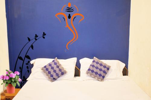 Postel nebo postele na pokoji v ubytování RELAX PAYING GUEST HOUSE