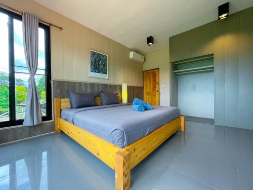 Katil atau katil-katil dalam bilik di Krin Resort