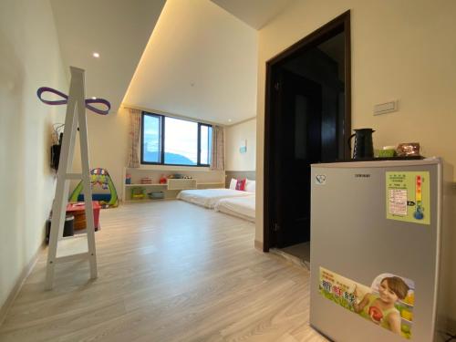 Ein Bett oder Betten in einem Zimmer der Unterkunft 育薦關山民宿 臺東縣民宿1585號