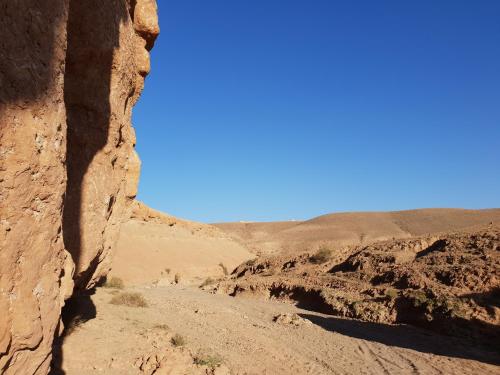 a dirt road in the desert at Nkhila Lodge in Marrakech