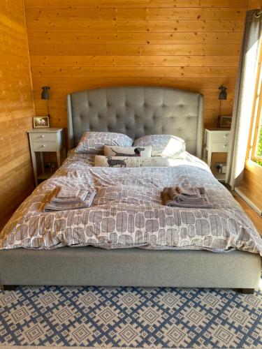 מיטה או מיטות בחדר ב-Modern Summerhouse