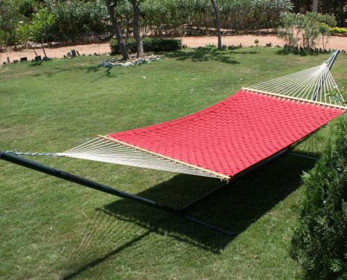a hammock on the grass in a park at Tathastu Pench in Khawāsa
