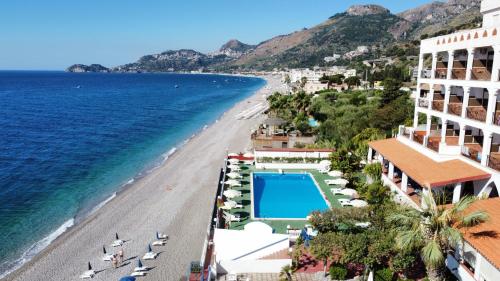 an aerial view of the beach and hotels at Park Hotel Silemi in Letojanni