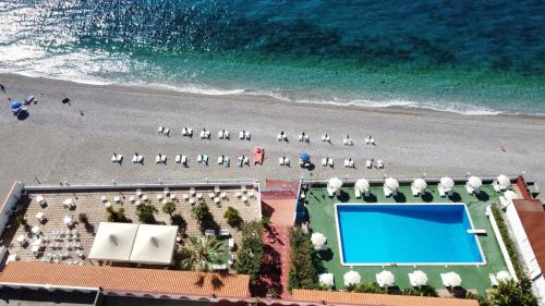 an aerial view of a beach with a swimming pool at Park Hotel Silemi in Letojanni