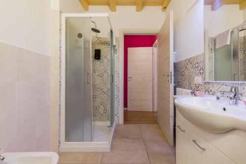 a bathroom with a sink and a shower at Giardino Giusti House & Court in Verona
