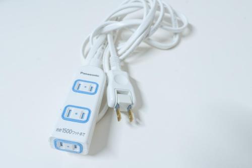 a white wii controller on a white background at Route Inn Grantia Tokai Spa&Relaxation in Tokai