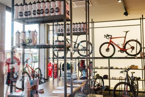 a store with bikes on display in a room at Golfo del Sole Hotel & Holiday Resort in Follonica