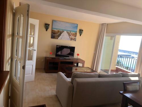 Zona de estar de Fantástico apartamento frontal en el mar Fuengirola