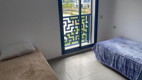 Postel nebo postele na pokoji v ubytování Appartement de luxe avec piscine a 5 min de la plage