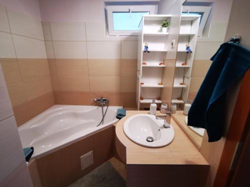 Kúpeľňa v ubytovaní Sunshine Apartmanok Szeged