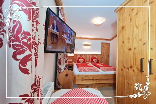 Postel nebo postele na pokoji v ubytování Haus Bartlmä