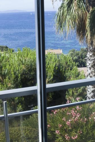 a view from a window of the ocean at Mare e Vista in Ajaccio