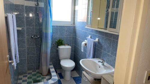 Ванна кімната в Apartmani Nada Borik Zadar